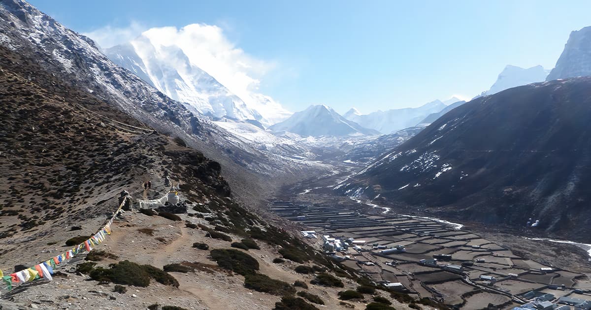 Prayer flags on the Nangkartshang ridge with Makalu beyond